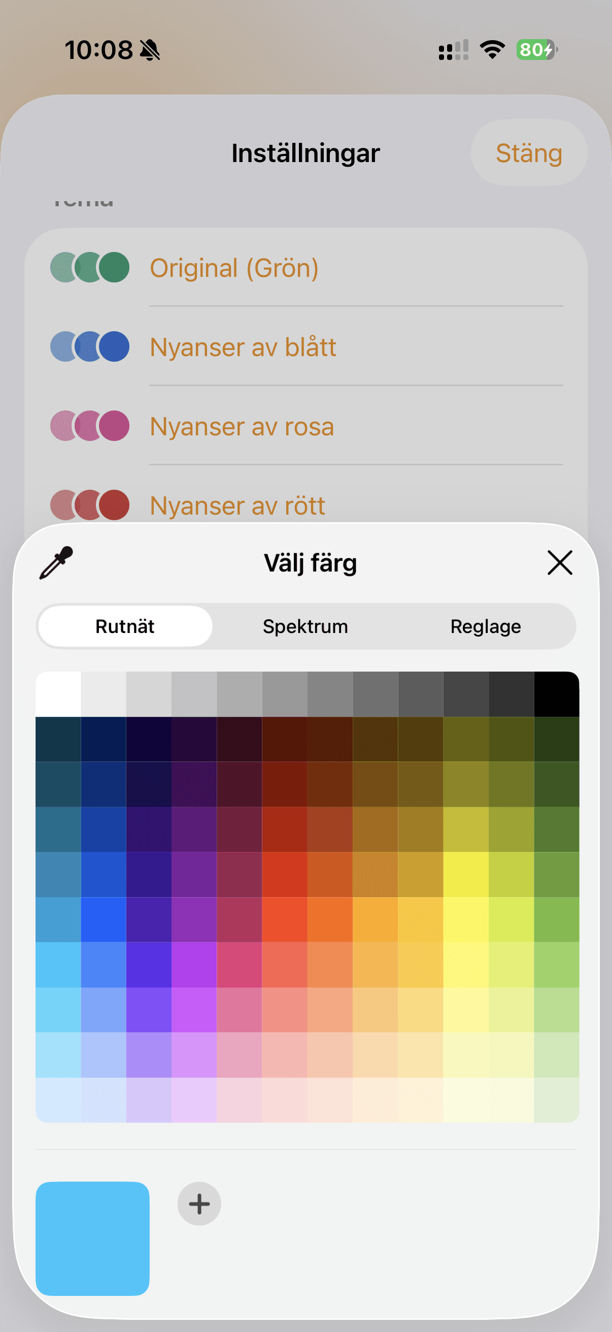 Inställningar med färgteman och Egen färg-väljaren öppen